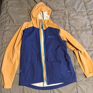 Cotopaxi Blue and Tan Rain Jacket Parque men’s large